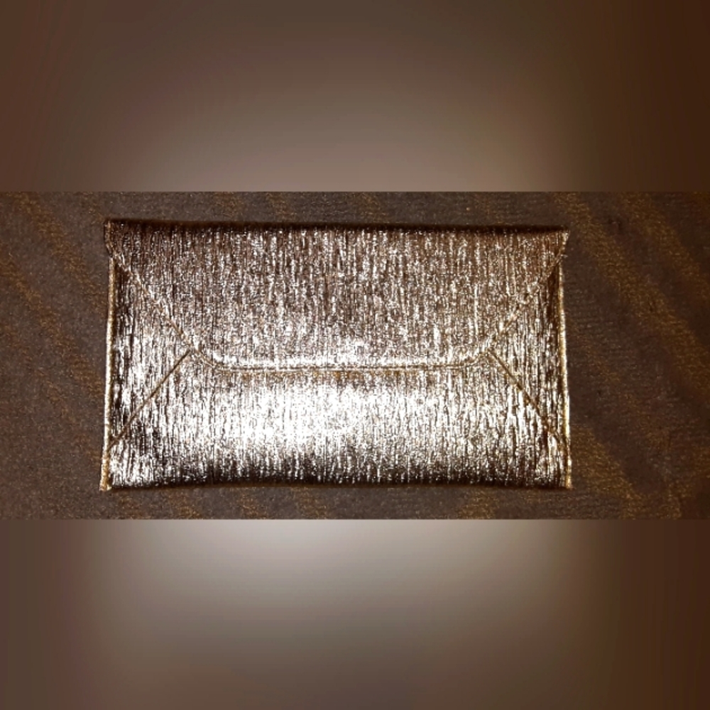Medium/Large metallic gold thin clutch brand new never used